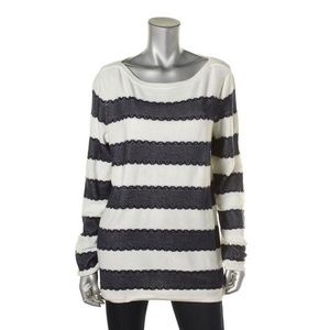 White & navy blue sweater (lace-like detail)